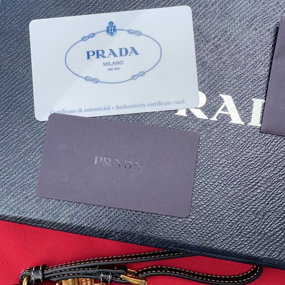⛔️SOLD⛔️ PRADA Black Wristlet with Gold accents. - Picture 5 of 16